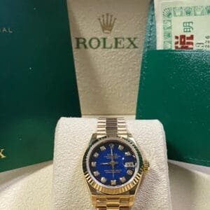 Rolex Yellow Gold Lady-Datejust 26 - N Serial - Fluted Bezel - Blue Vignette Diamond Dial - President Bracelet - 69178