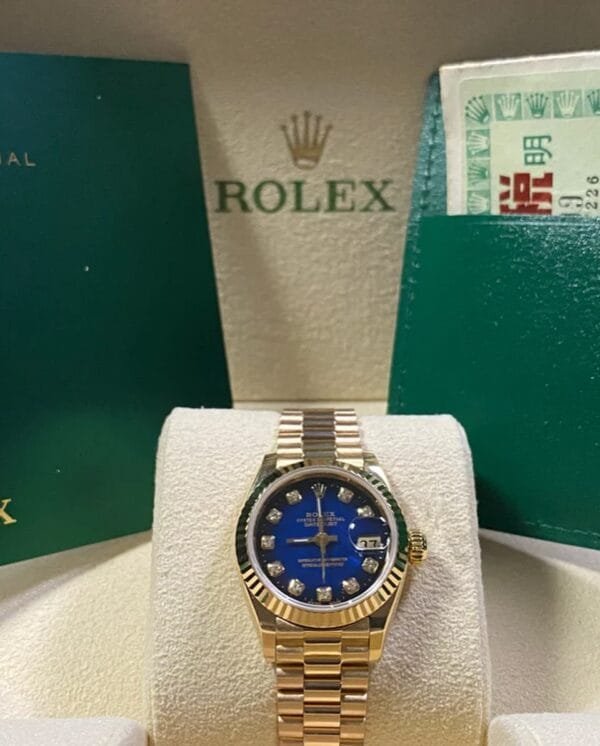 Rolex Yellow Gold Lady-Datejust 26 - N Serial - Fluted Bezel - Blue Vignette Diamond Dial - President Bracelet - 69178