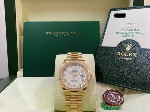 Rolex Yellow Gold Day-Date 36 - P Serial - Baguette Diamond Bezel - White Roman Dial - President Bracelet - 118398BR