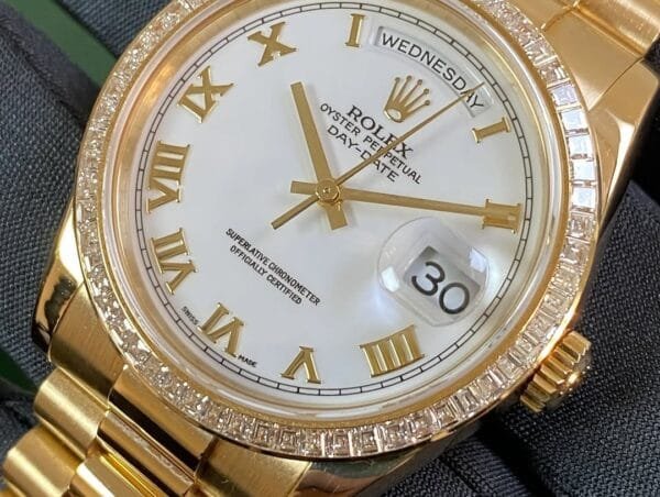 Rolex Yellow Gold Day-Date 36 - P Serial - Baguette Diamond Bezel - White Roman Dial - President Bracelet - 118398BR - Image 2