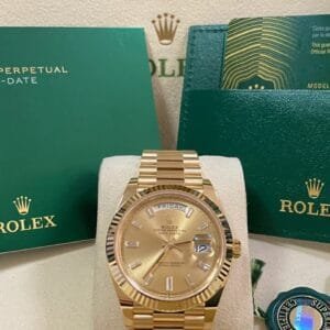 olex Yellow Gold Day-Date 40 - 2023 - Fluted Bezel - Baguette Diamond Dial - President Bracelet - 228238