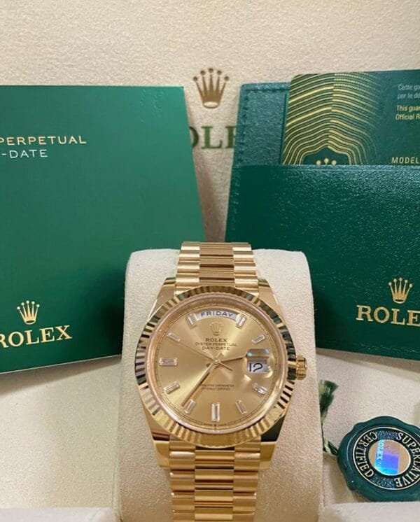 olex Yellow Gold Day-Date 40 - 2023 - Fluted Bezel - Baguette Diamond Dial - President Bracelet - 228238