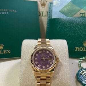 Rolex Yellow Gold Lady-Datejust - Y Serial - Fluted Bezel - Rubelite Diamond Dial - President Bracelet - 179178