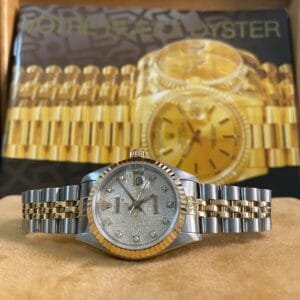 Rolex Steel and Yellow Gold Lady-Datejust - E serial - Fluted Bezel - Silver Anniversary Diamond Dial - Jubilee Bracelet - 69173