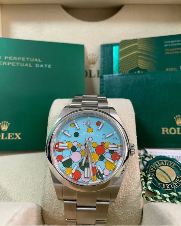 Rolex Oyster Perpetual 41 - 2023 - Domed Bezel - Turquoise Blue Celebration-Motif Dial - Oyster Bracelet - 124300 *FULL SET*